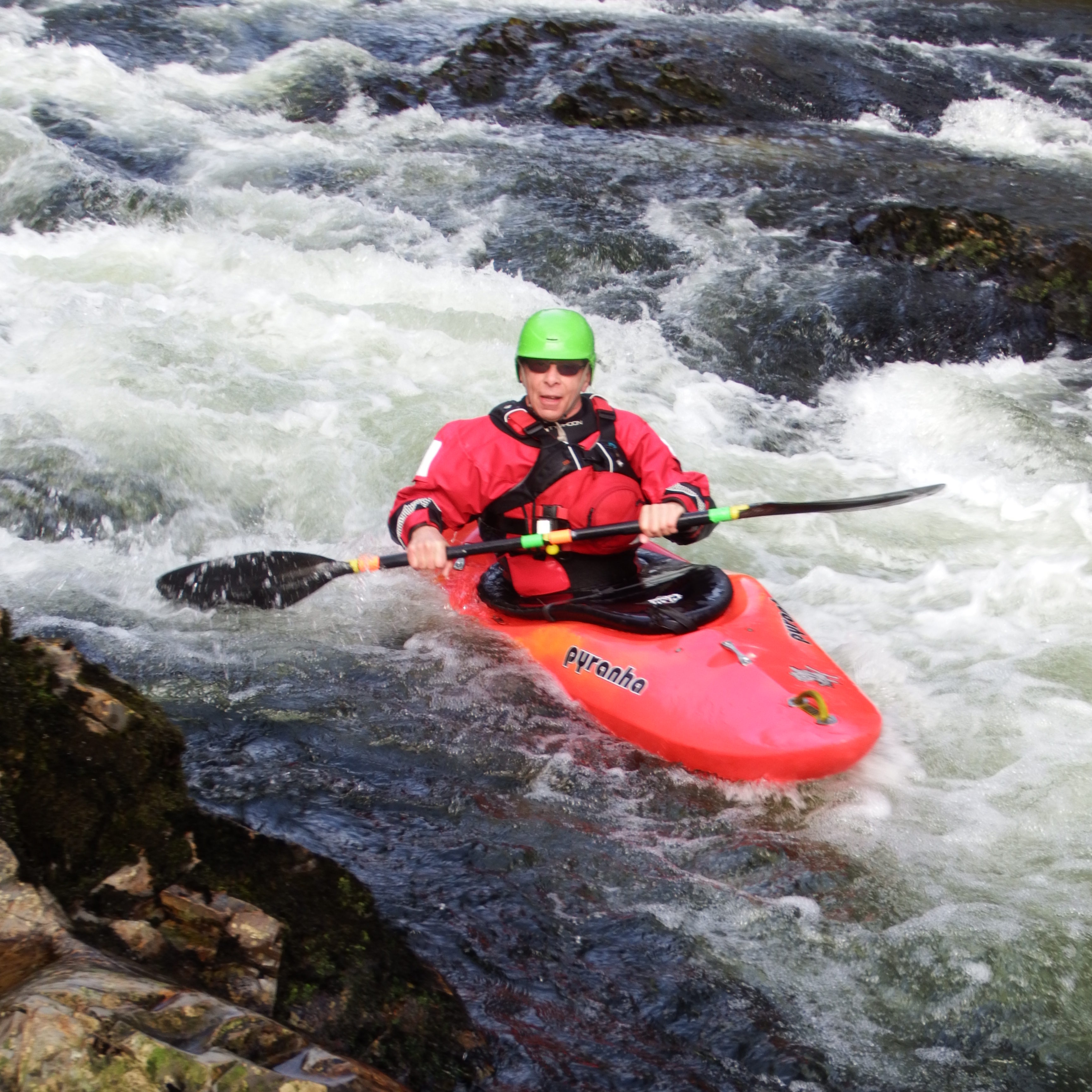 Pat kayaking down the river Dart
